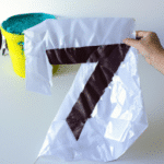 Tutorial para hacer una piñata en forma de número 7.